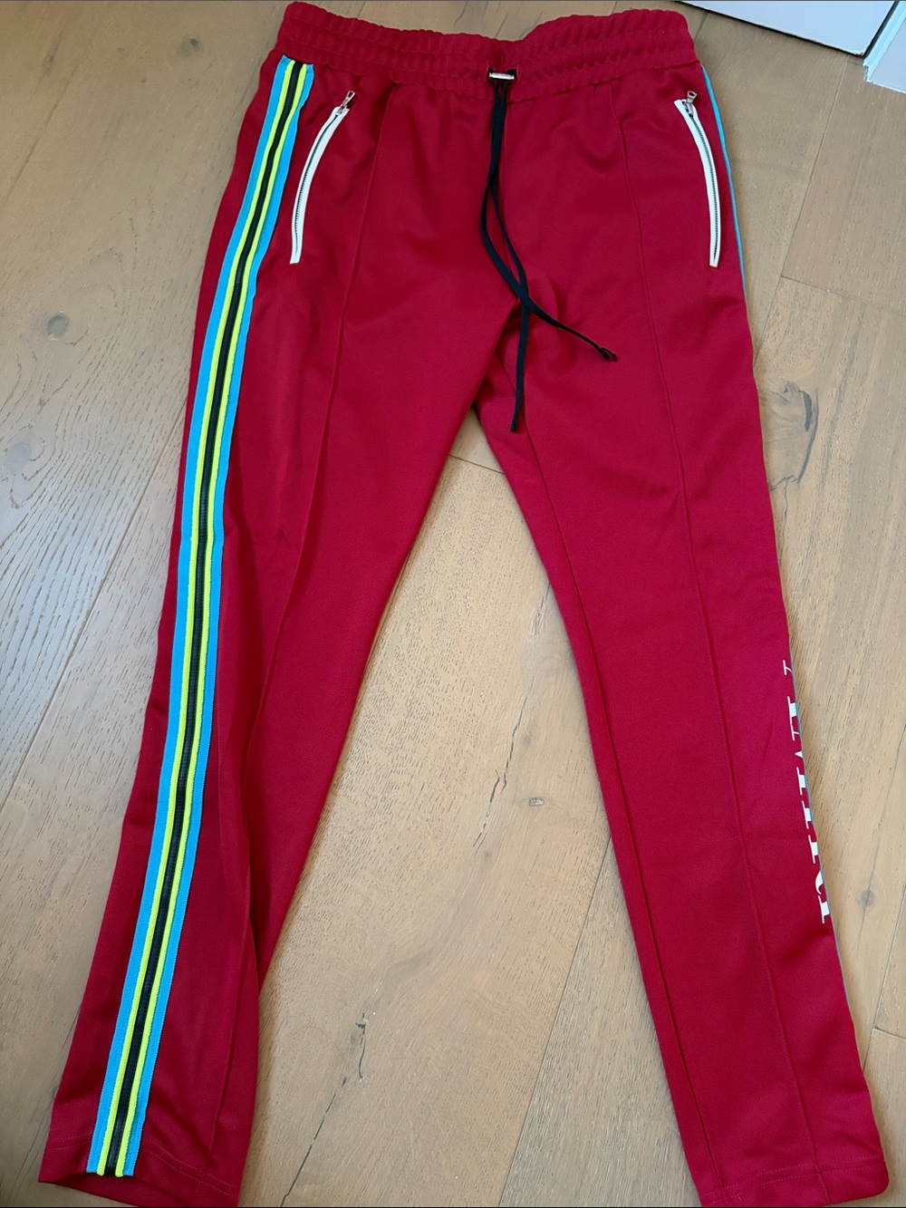 AMIRI Red Track Pants with Side Stripe Detail
